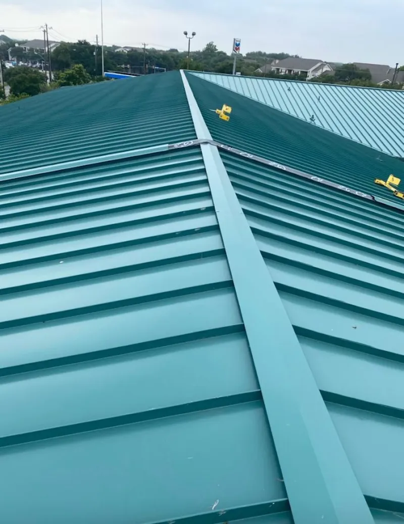 Green commercial metal roof ridge and valley for Metal Roof Repair in Brockport